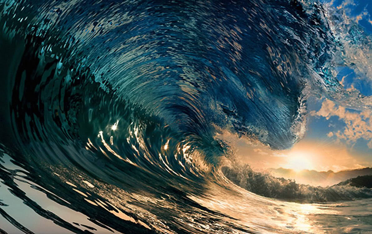 Movement begins within - an ocean wave breaking.